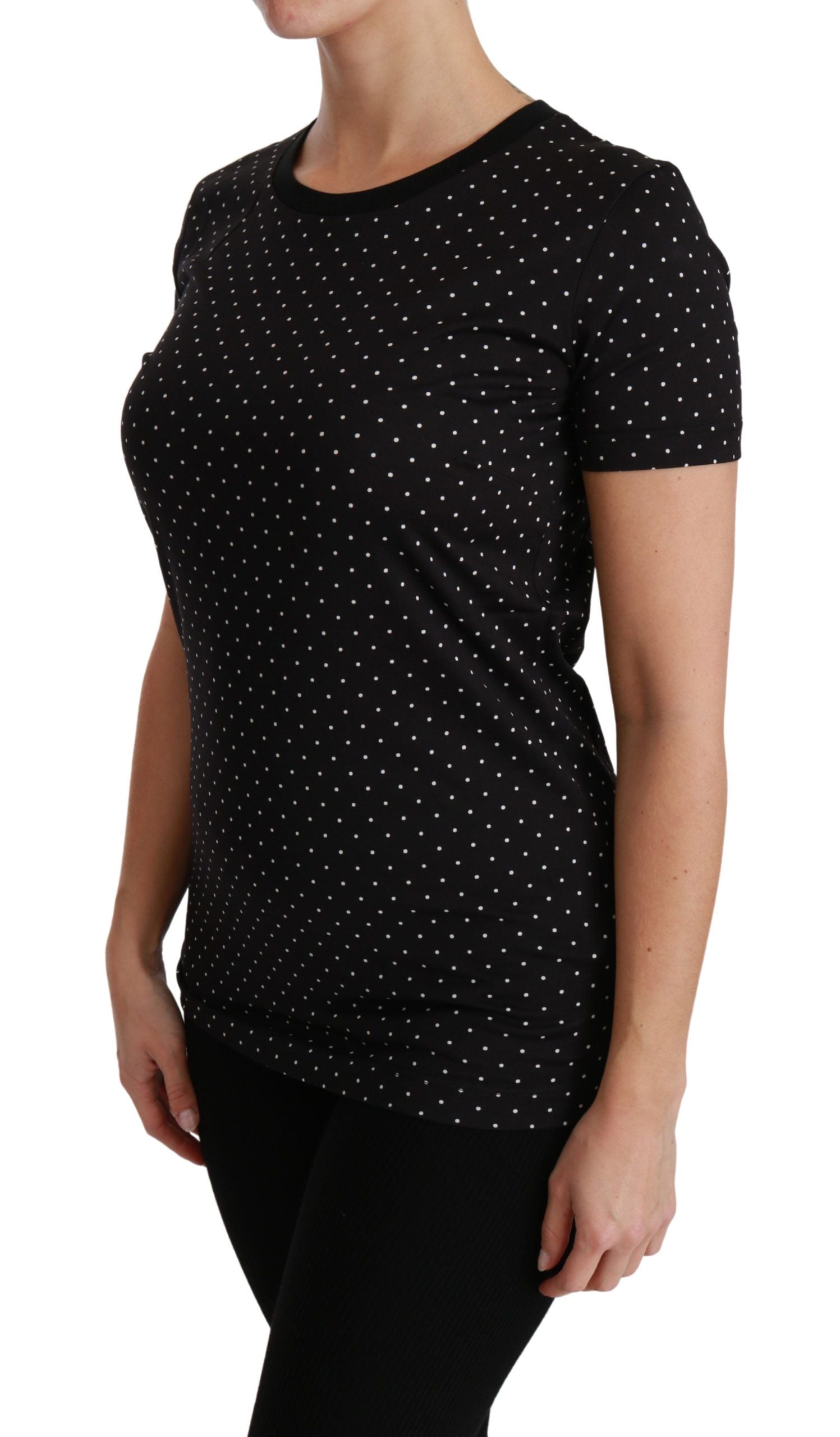 Black short sleeve polka dot shirt on woman