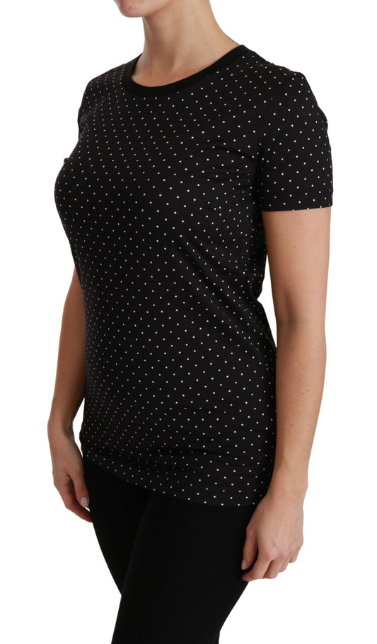 Black short sleeve polka dot shirt on woman