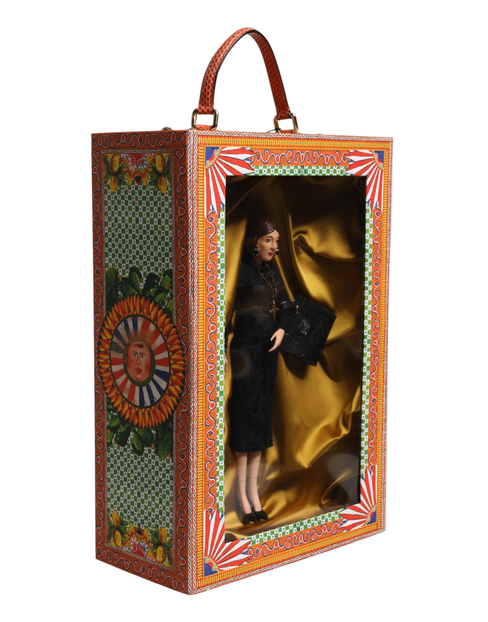 A ceramic porcelain doll wearing a black dress, part of the Dolce & Gabbana fashion collection