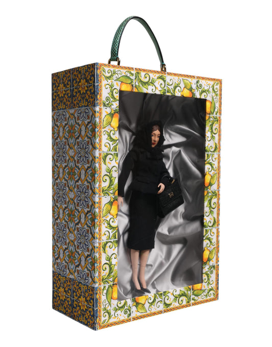 A ceramic porcelain fashion doll wearing a black dress with leather details