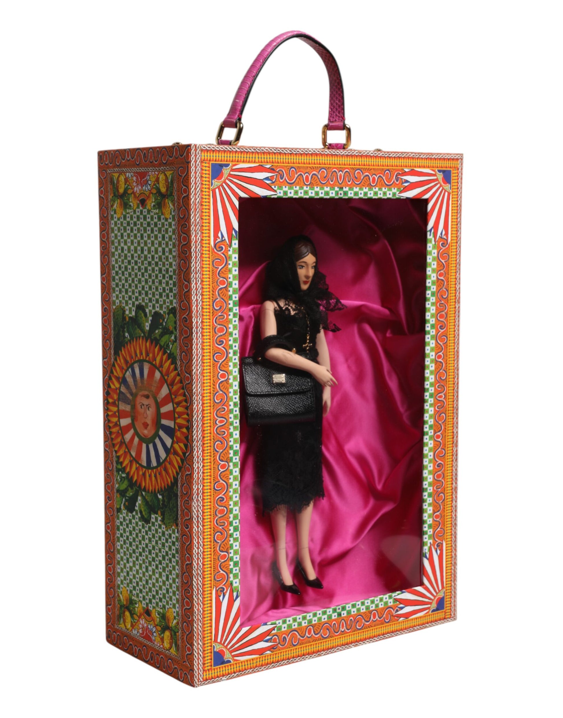 A porcelain doll wearing a black dress with gold accents, designed by Dolce & Gabbana