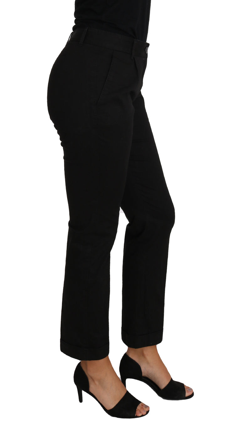 Pair of black trousers and heels on a model