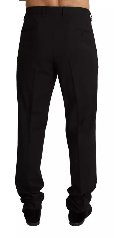 A pair of black dress pants from Dolce & Gabbana, featuring a skinny fit and a formal design