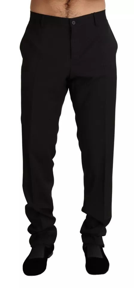 A pair of black dress pants from Dolce & Gabbana, featuring a skinny fit and a formal design