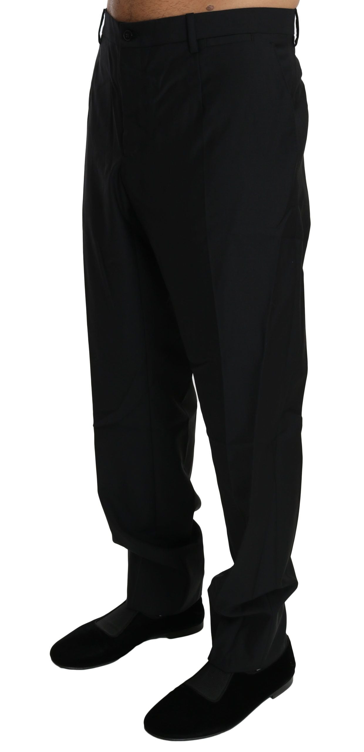 A pair of black wool trousers for men, featuring a formal design and the brand name "Dolce & Gabbana" visible on the waistban