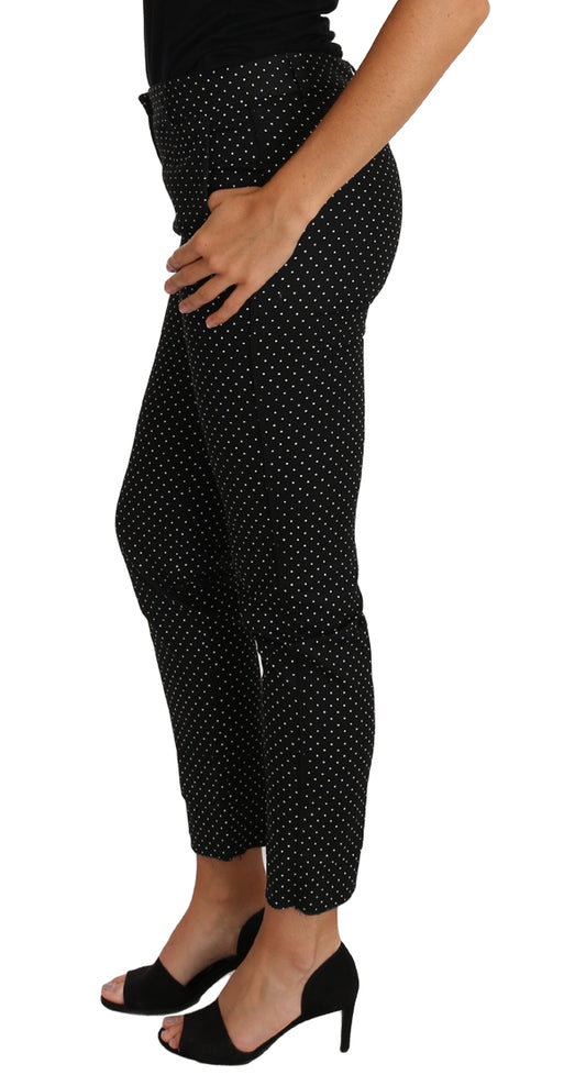 Pair of black pants with white polka dots