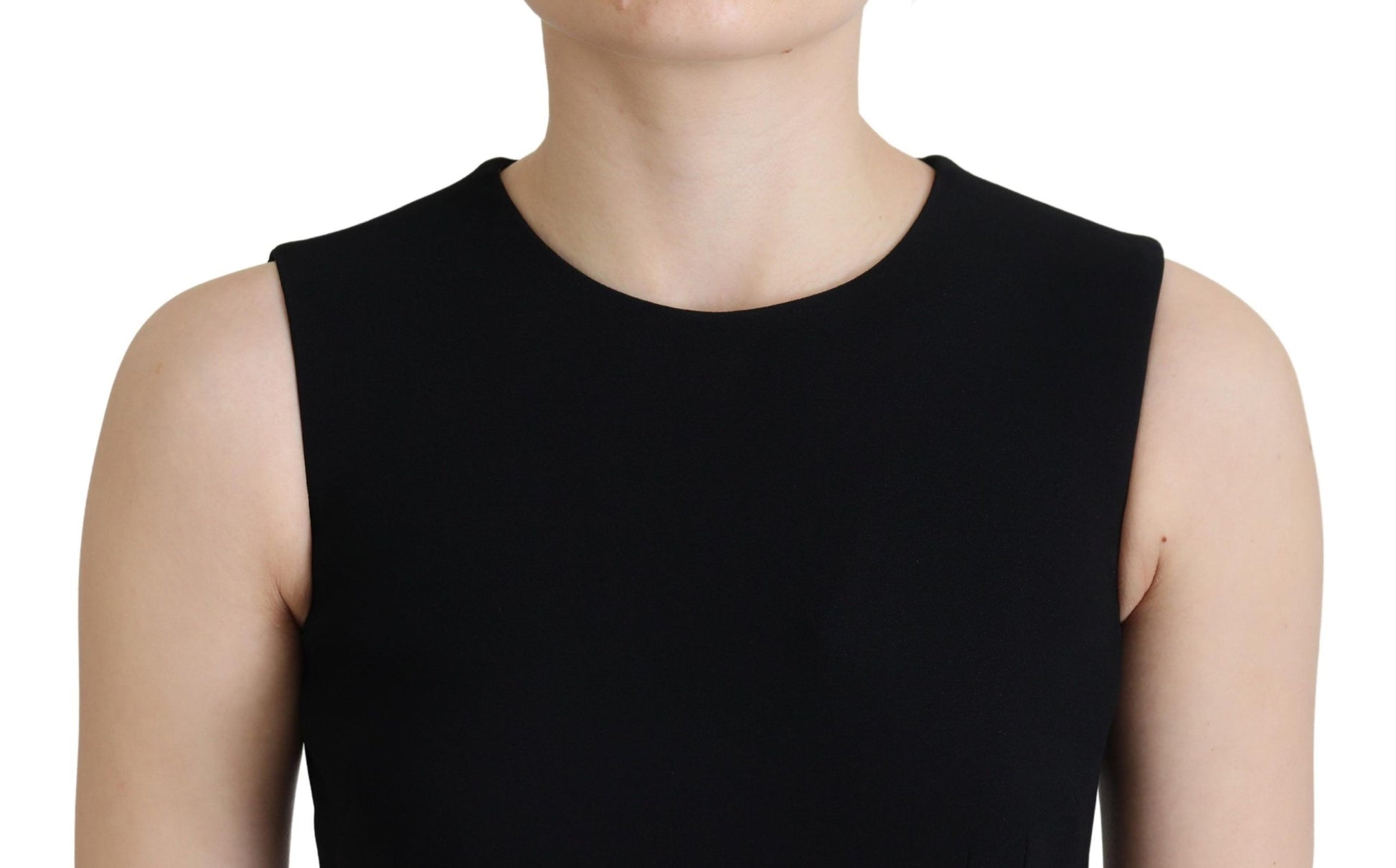 A black dress with a sheath silhouette, flare sleeves and viscose material