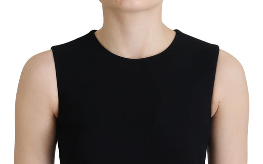 A black dress with a sheath silhouette, flare sleeves and viscose material
