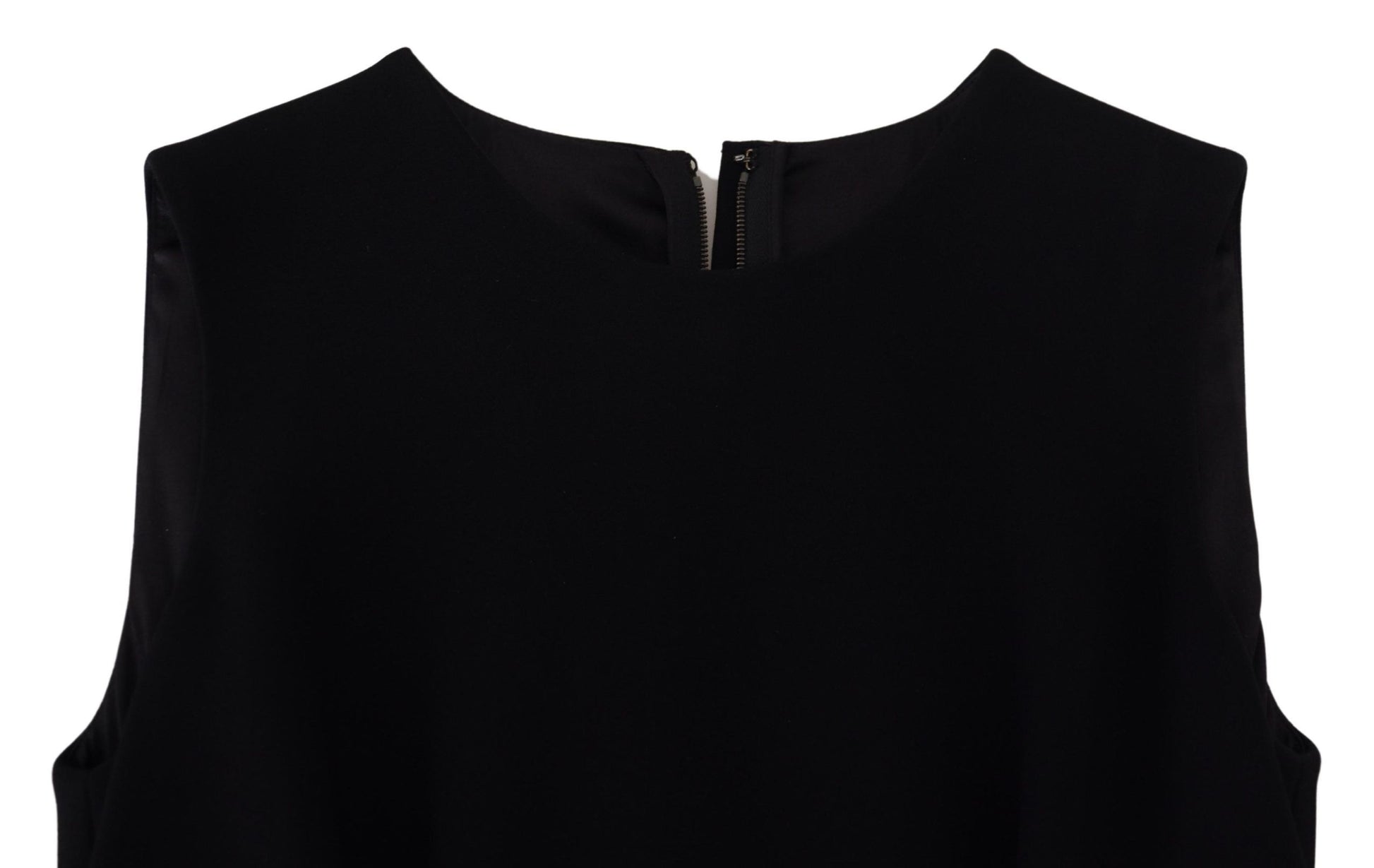 A black dress with a sheath silhouette and flare skirt, made of viscose fabric