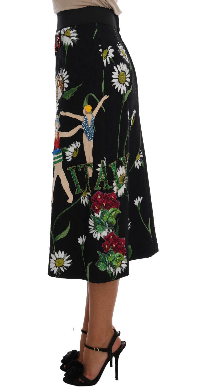 Black skirt with floral pattern featuring flowers and dancers