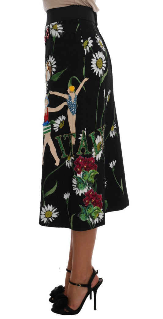 Black skirt with floral pattern featuring flowers and dancers