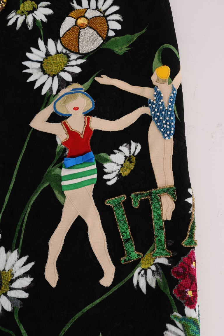 Embroidered beach scene on fabric