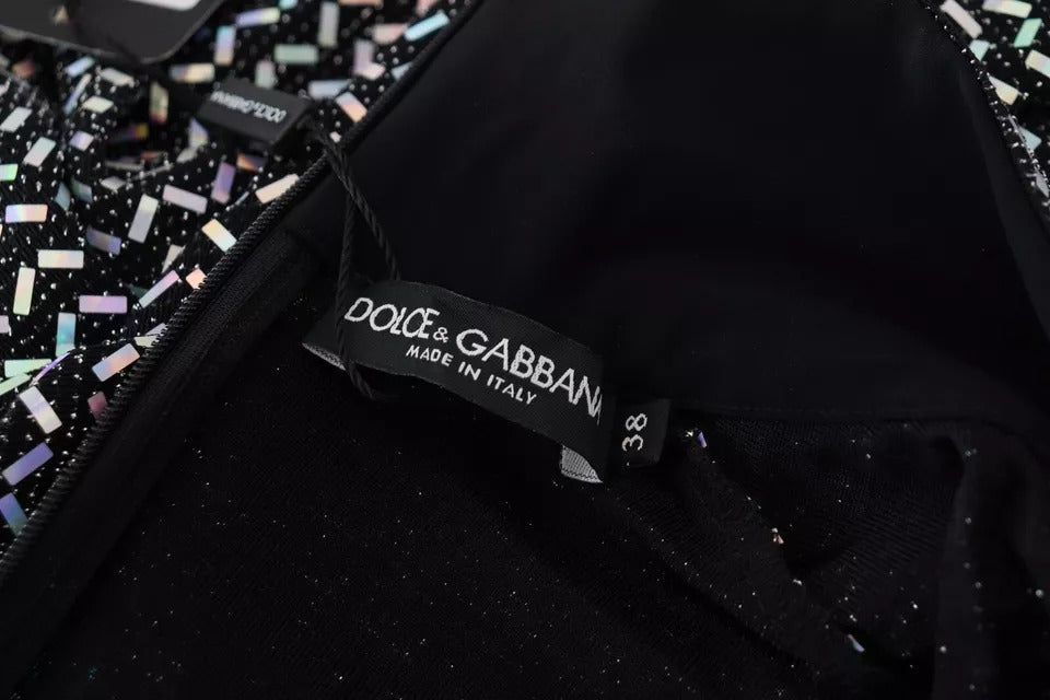 A black nylon dress with glittery embellishments and a body-hugging fit