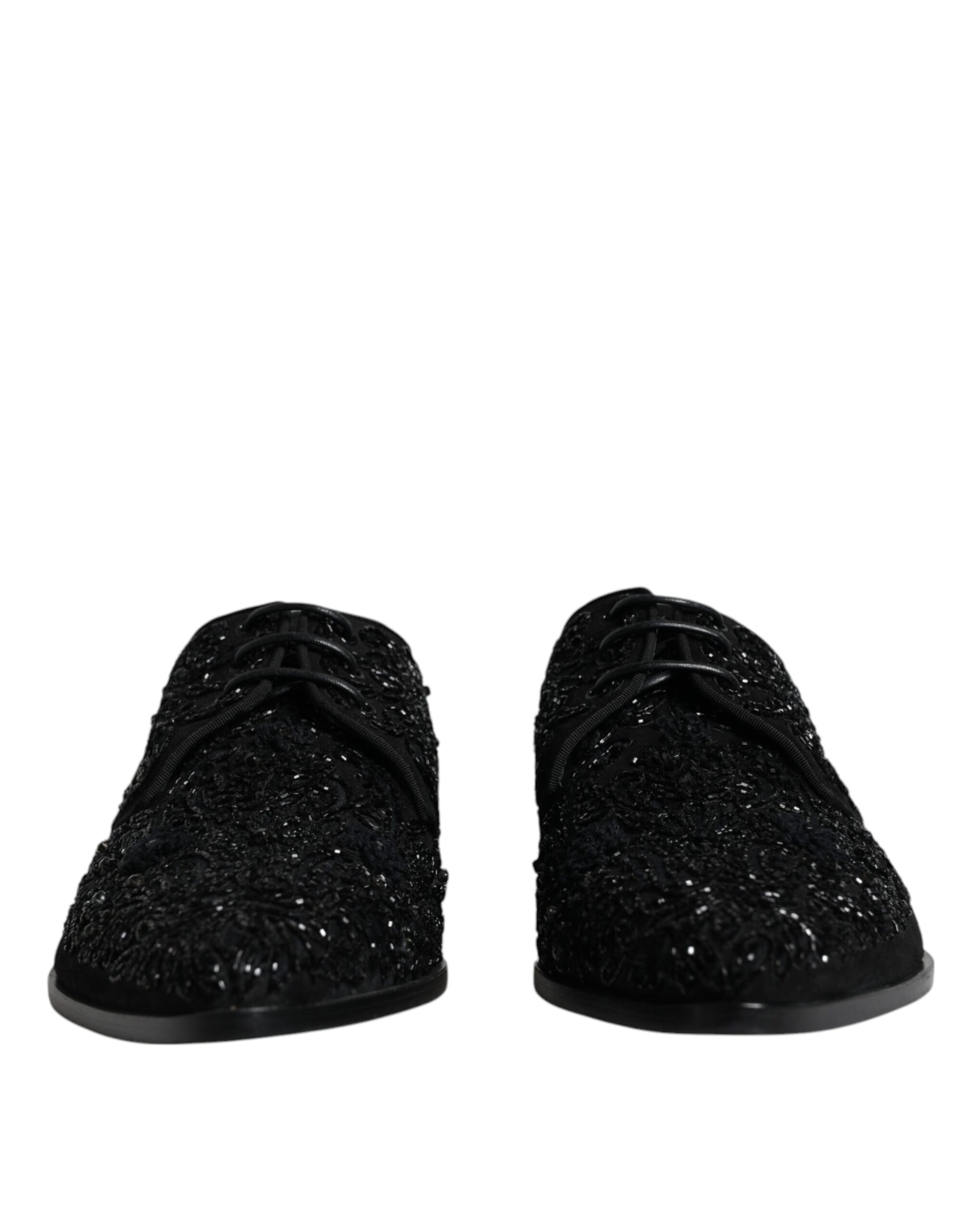 Pair of black glittery slippers