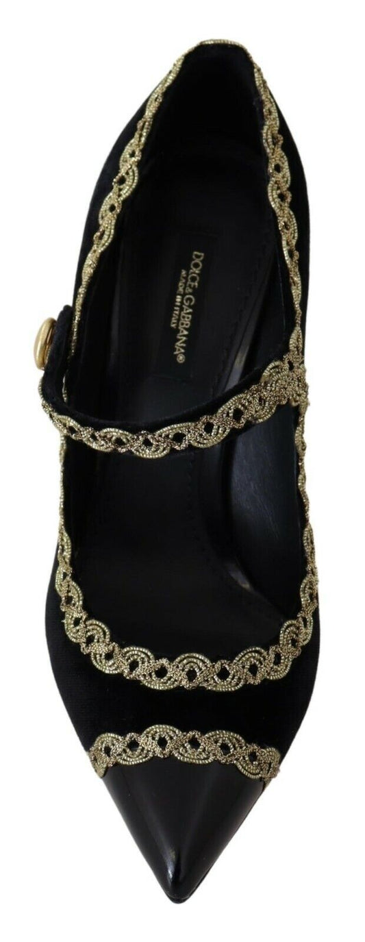 Black high heel shoe with gold embellishments and a strap across the foot