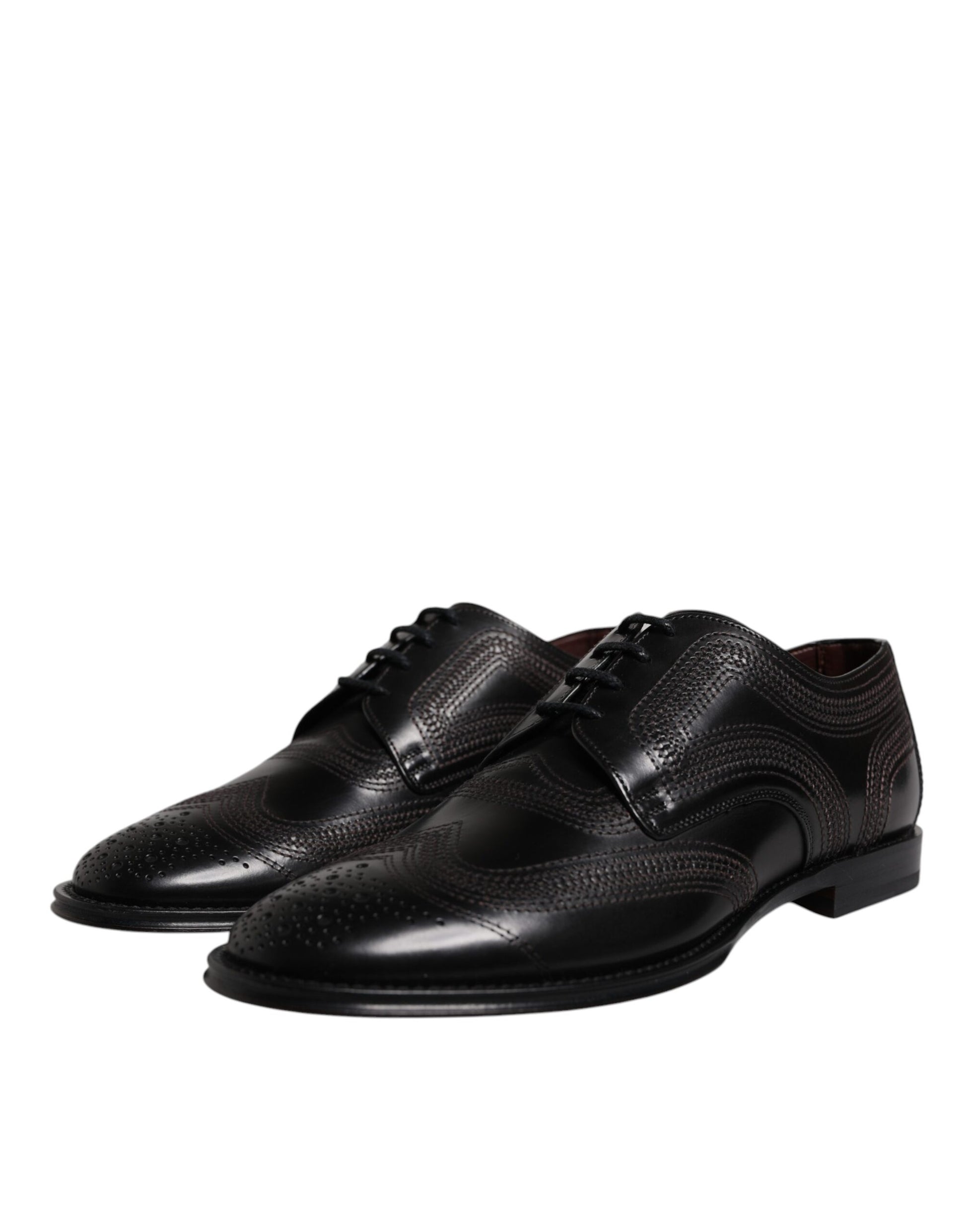 Pair of black embroidered leather dress shoes with laces and elastic, featuring a classic design