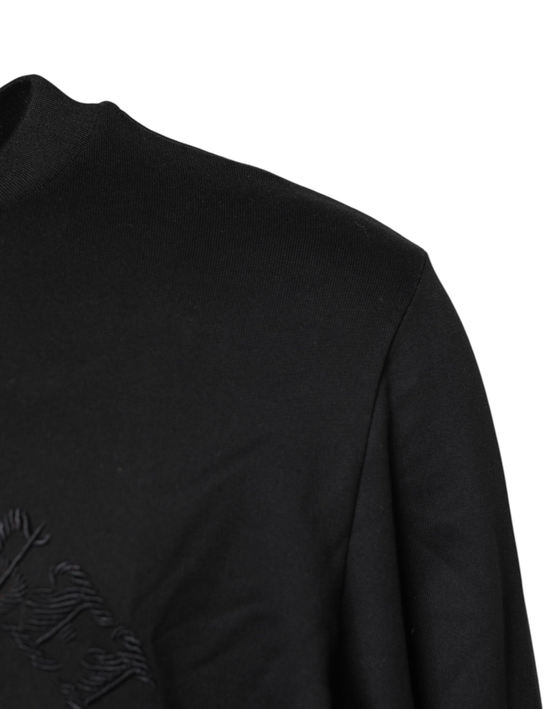 Black long sleeve shirt on a mannequin