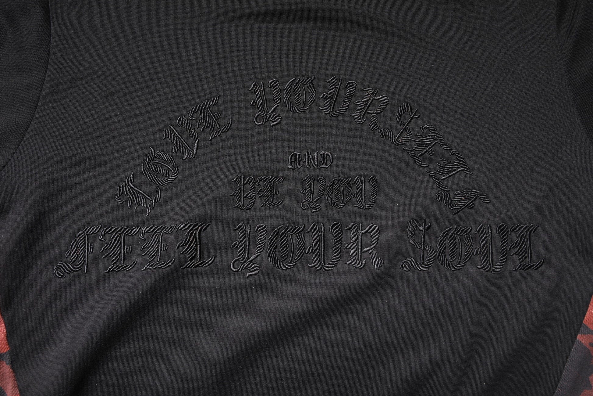 Black shirt with embroidered logo