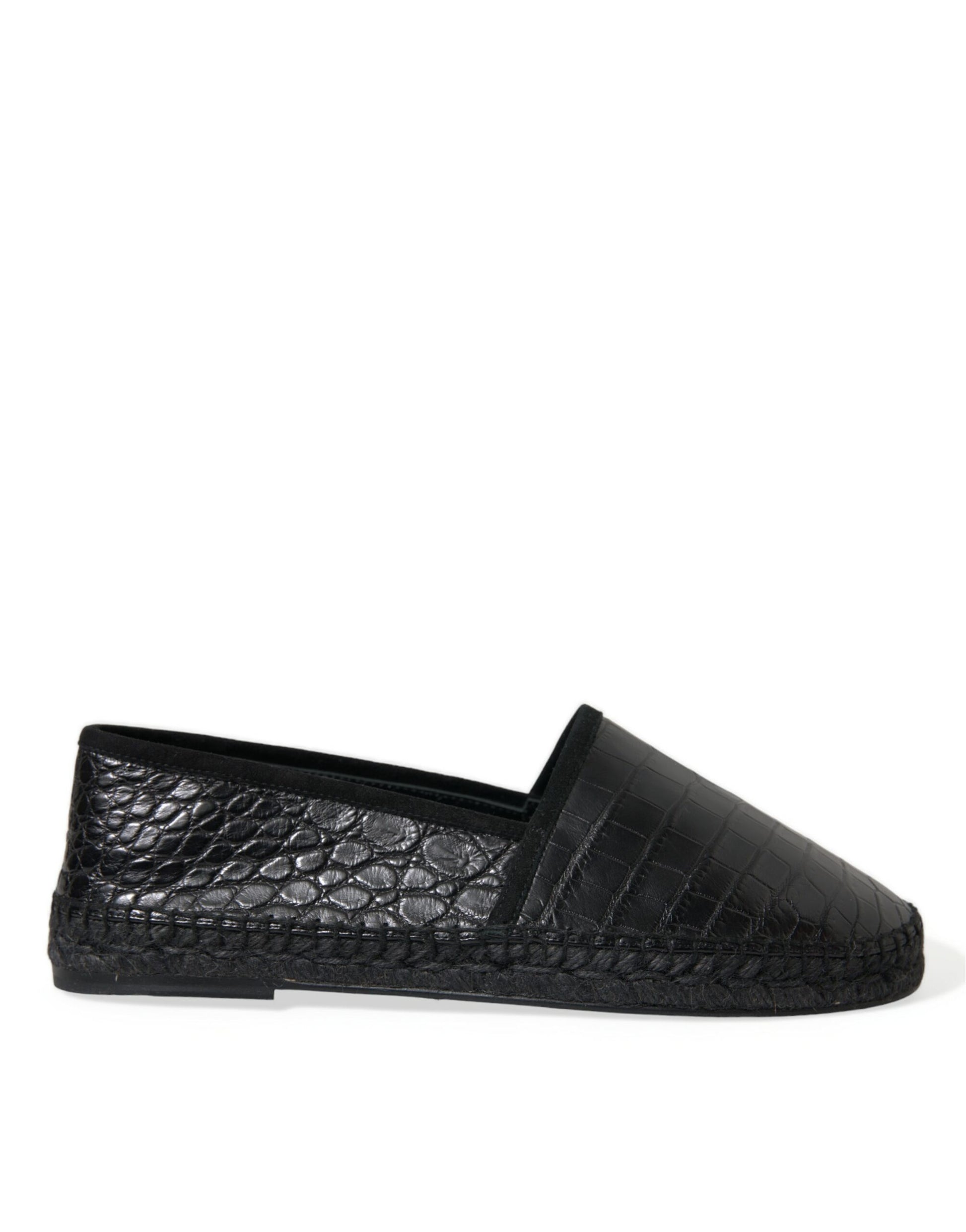 Black slip on shoe with embossed pattern