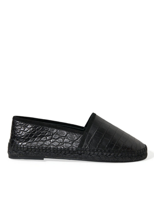 Black slip on shoe with embossed pattern