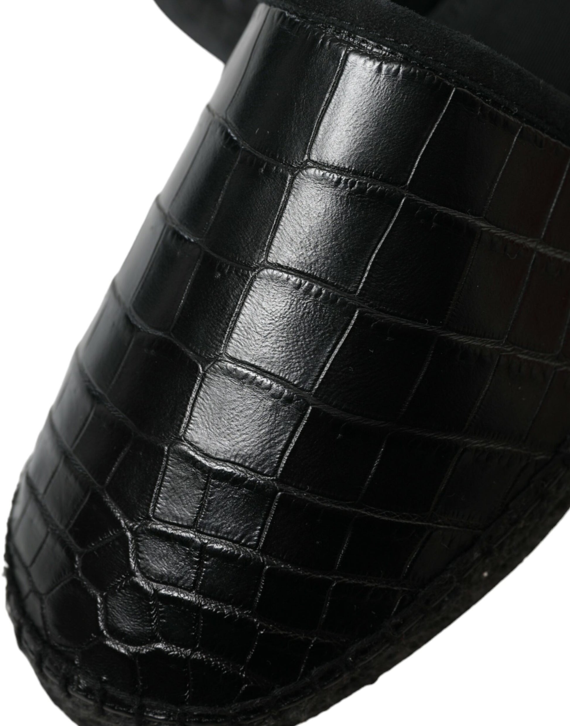 Black leather shoe with a crocodile skin texture