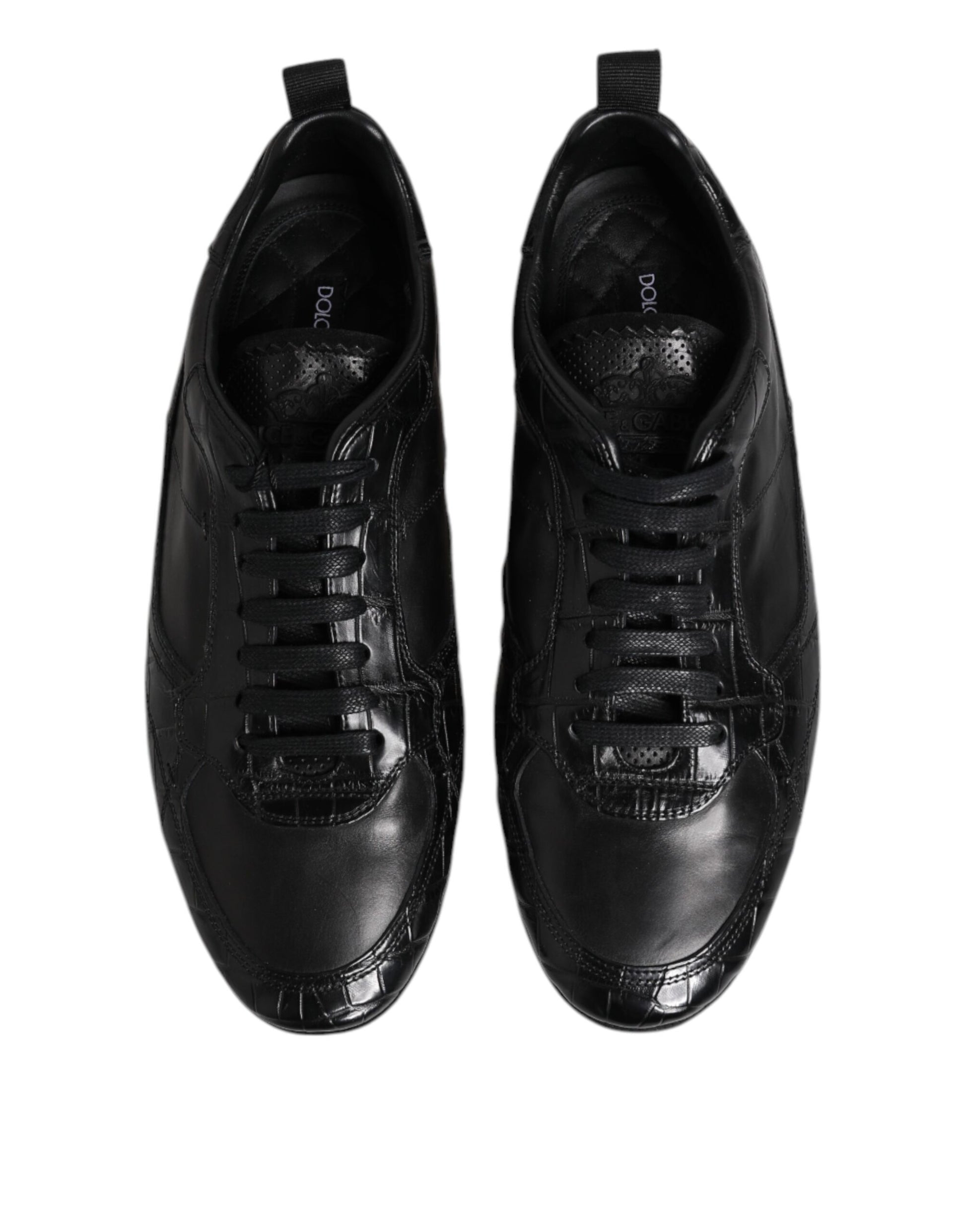 Pair of black exotic leather low top sneakers with laces and embossed logo