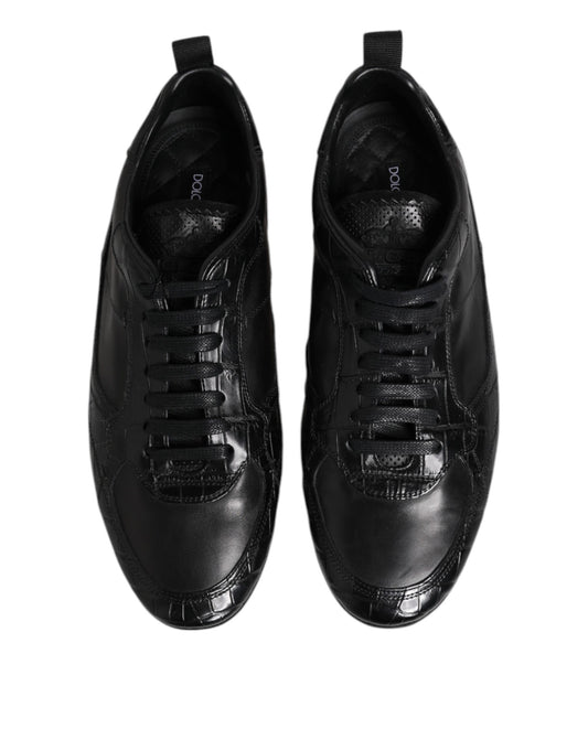 Pair of black exotic leather low top sneakers with laces and embossed logo