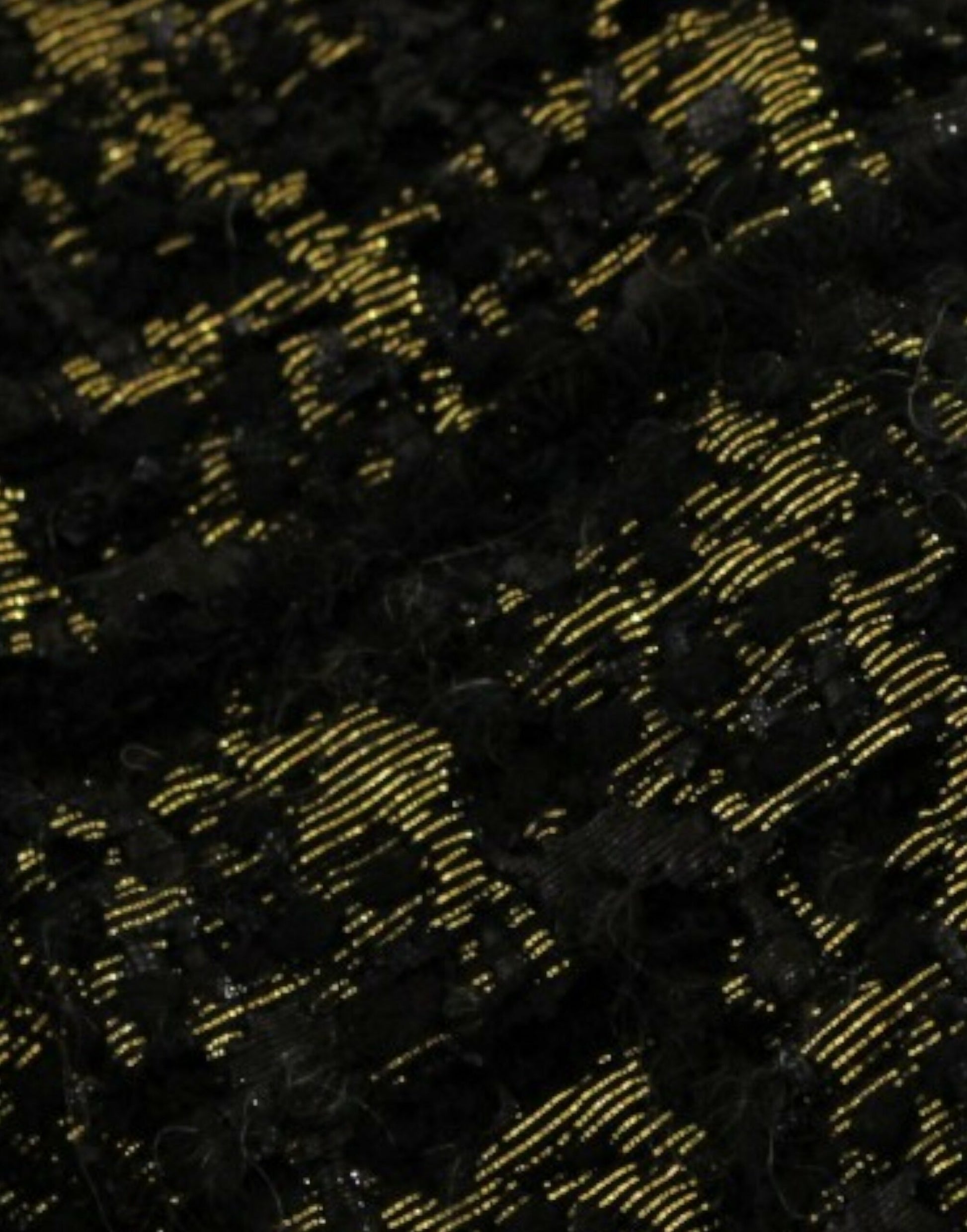Textured fabric with yellow and black patterns