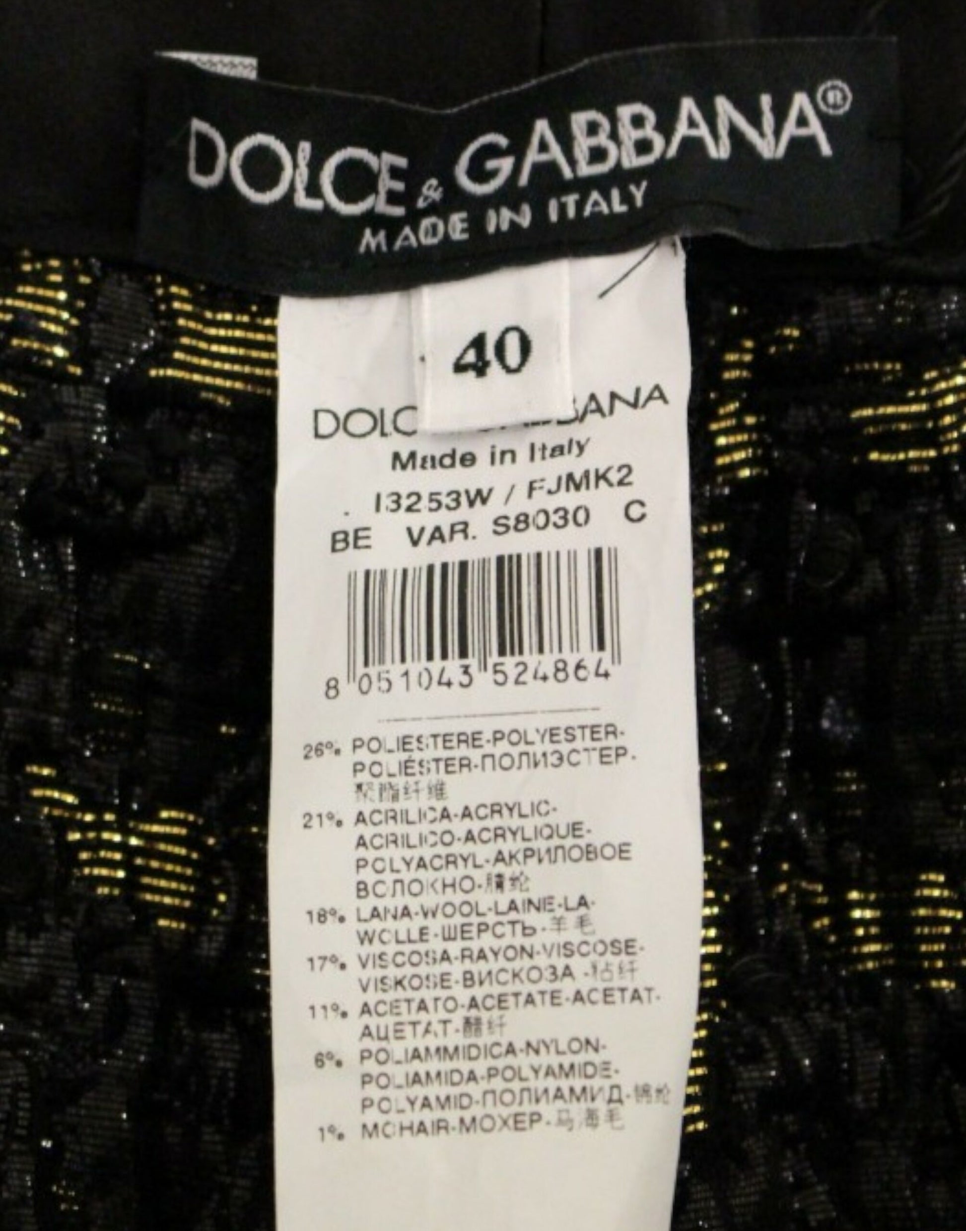 Black label on garment with white lettering