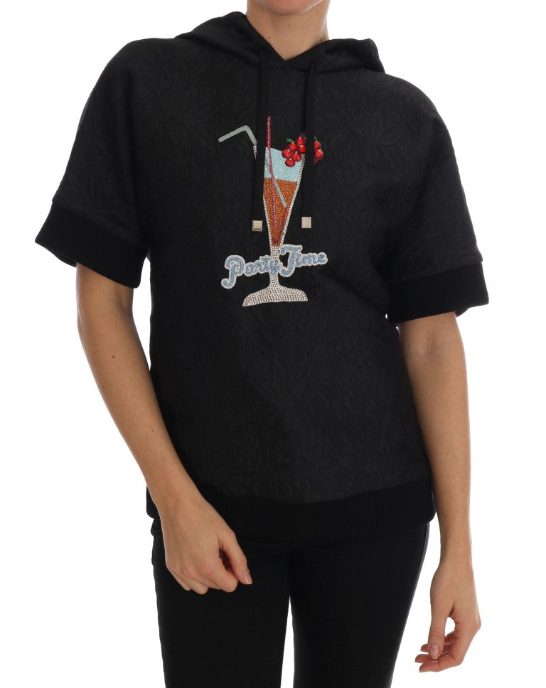 Black hoodie with graphic design on front