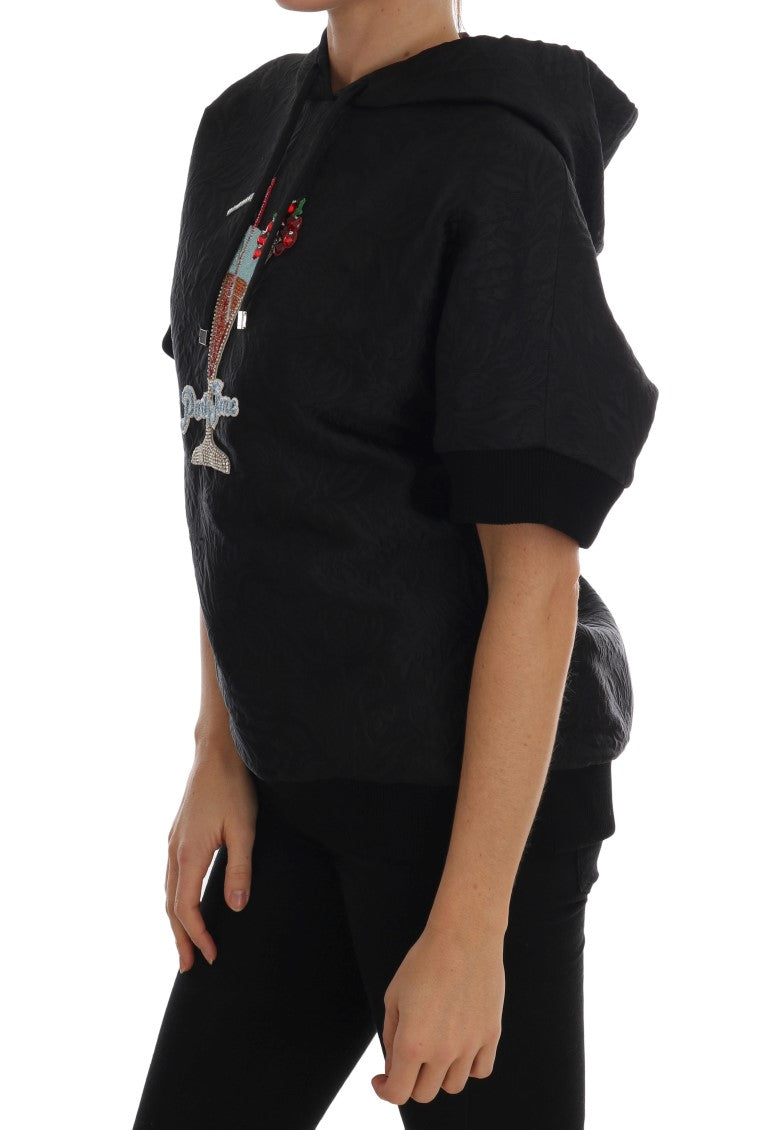 Black hoodie with embroidered design on front