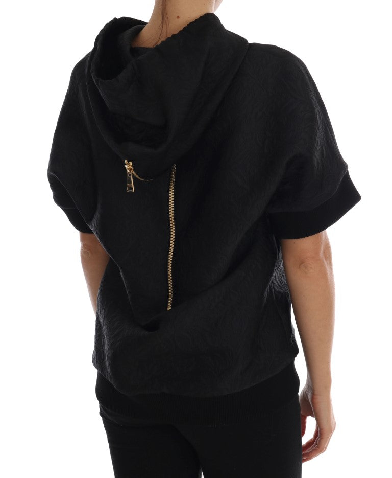Black hooded sweatshirt with gold zipper pull