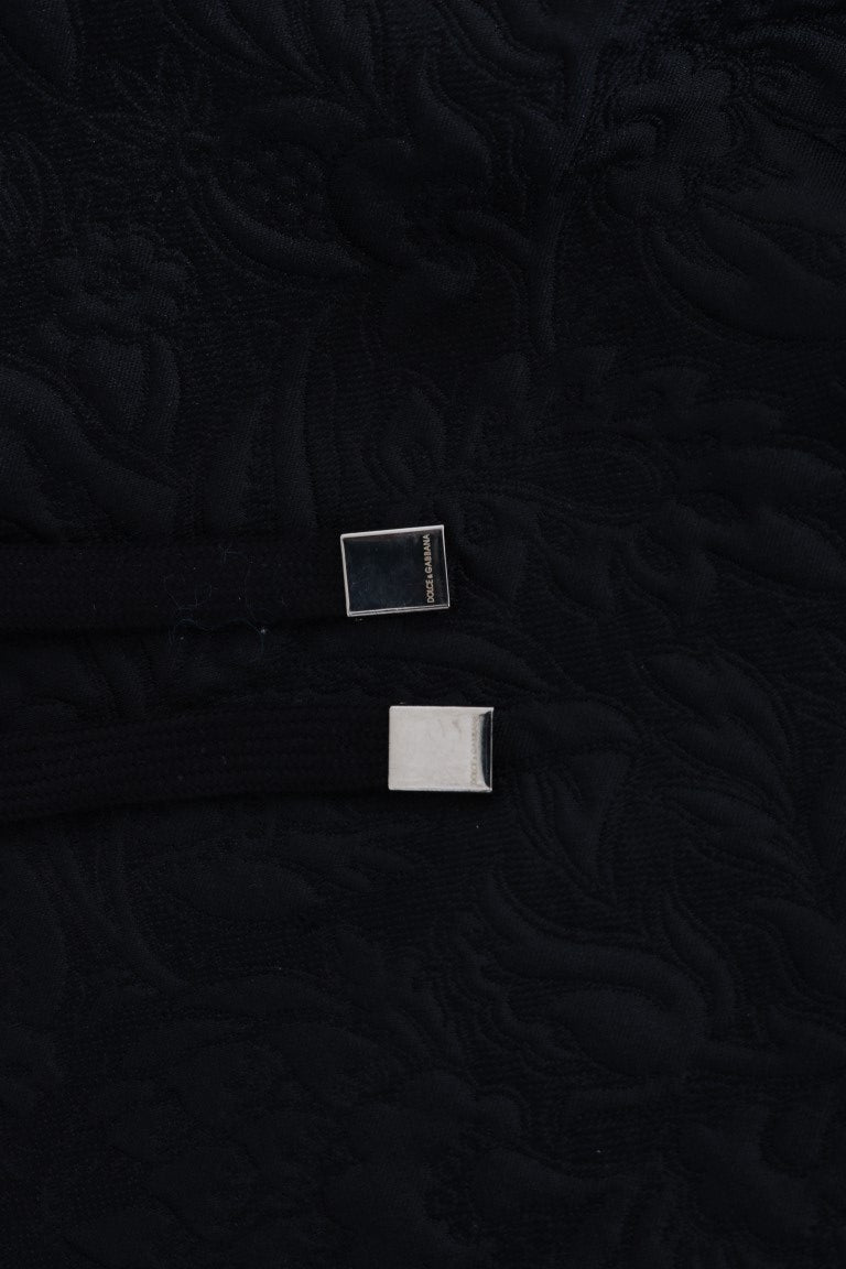 Small white square object on black surface