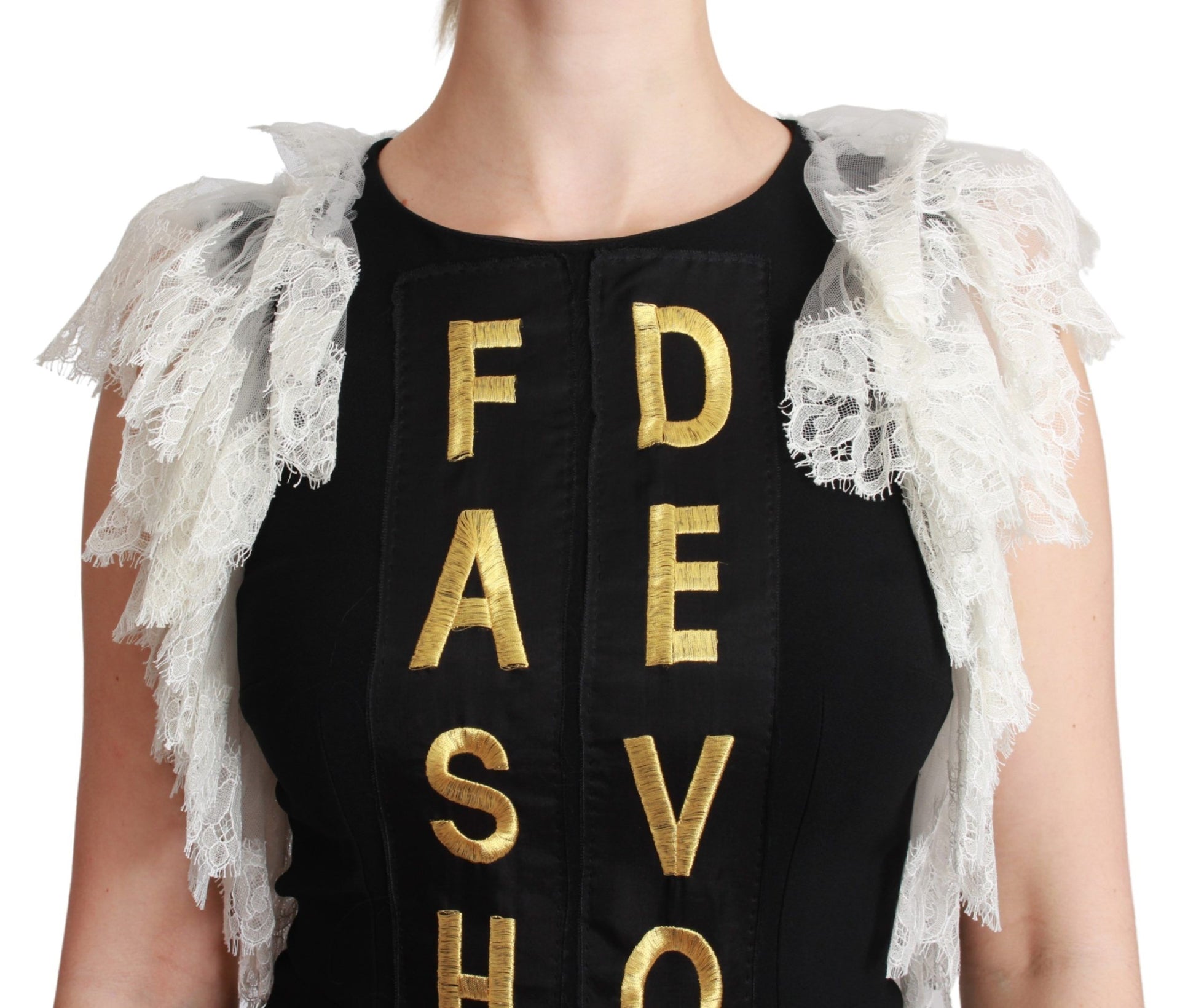 A black sheath dress with gold lettering on front, featuring the words "FASHION DEVOTION"