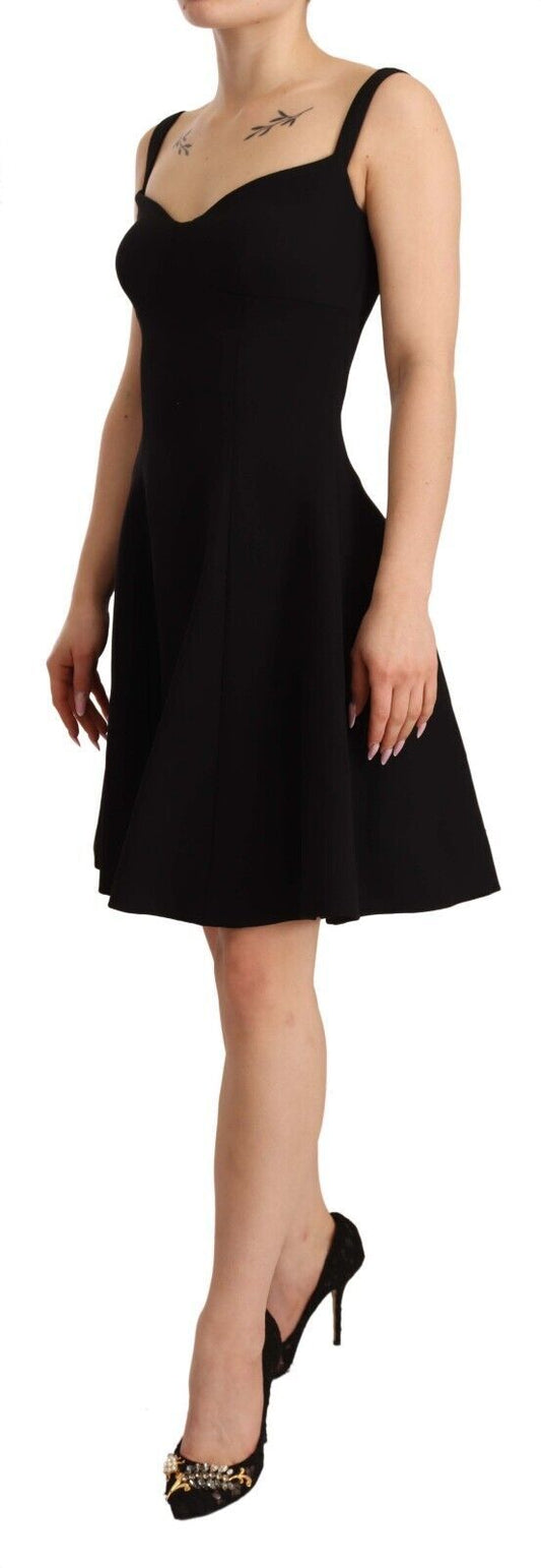 A black fit flare wool stretch sheath dress with a V-neckline
