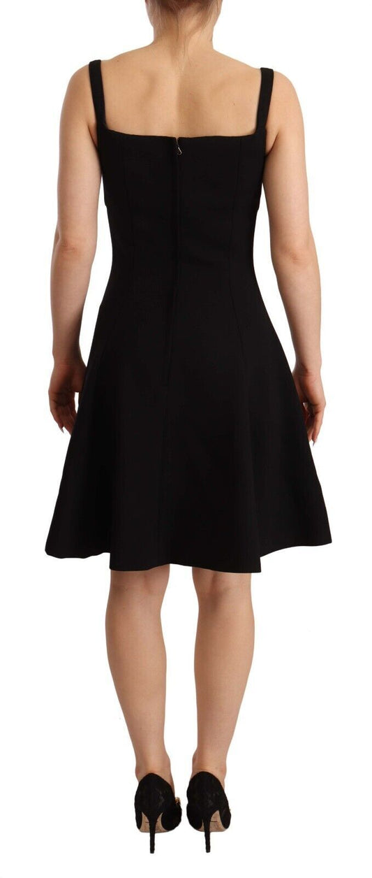 A black fit flare wool stretch sheath dress by Dolce & Gabbana