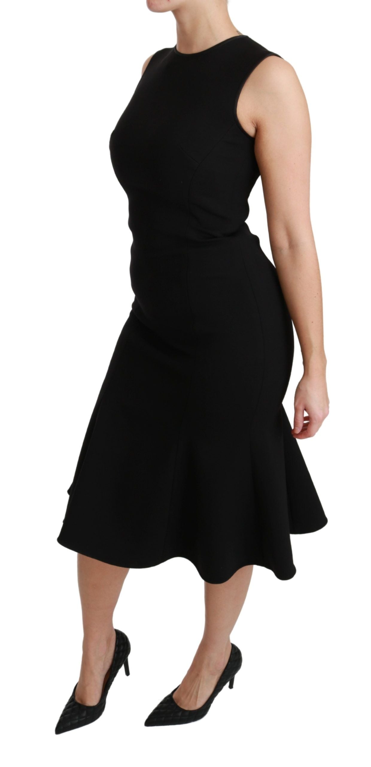 A black fit flare wool stretch sheath dress with short sleeves and a flared skirt