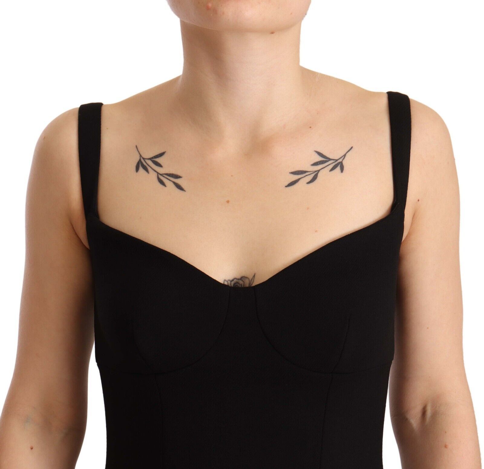 A black dress with a fit-flare silhouette, featuring wool stretch fabric and a sheath design