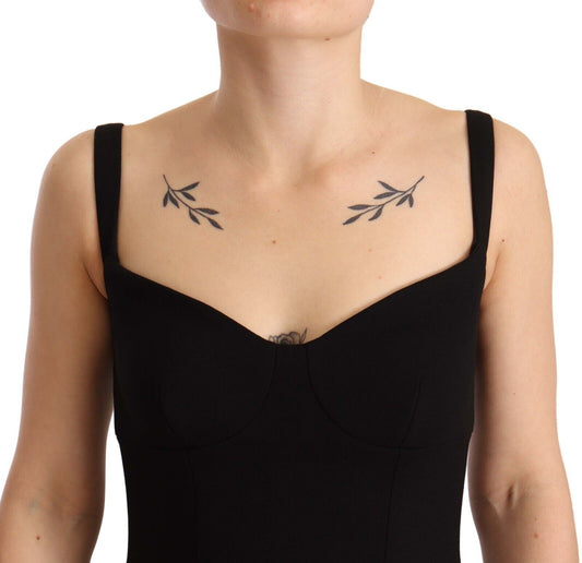 A black dress with a fit-flare silhouette, featuring wool stretch fabric and a sheath design