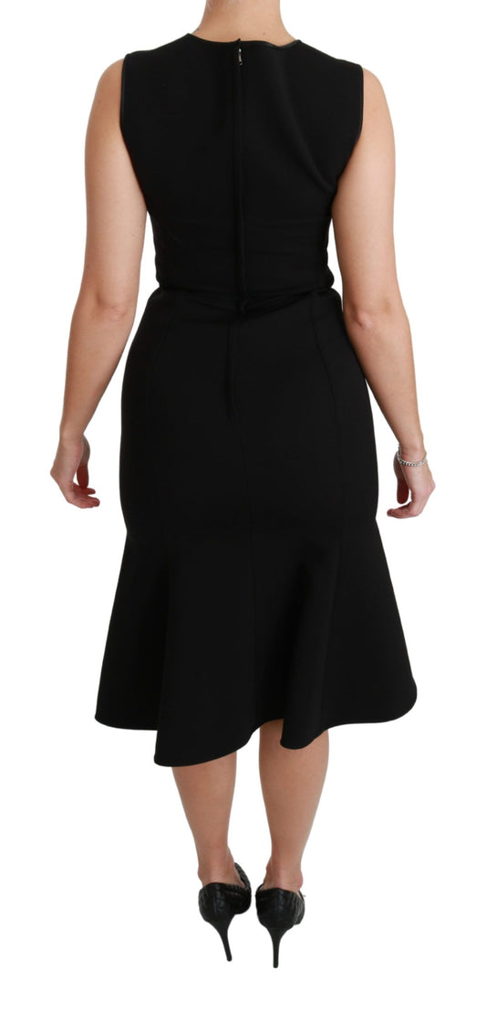 A black fit flare wool stretch sheath dress from Dolce & Gabbana