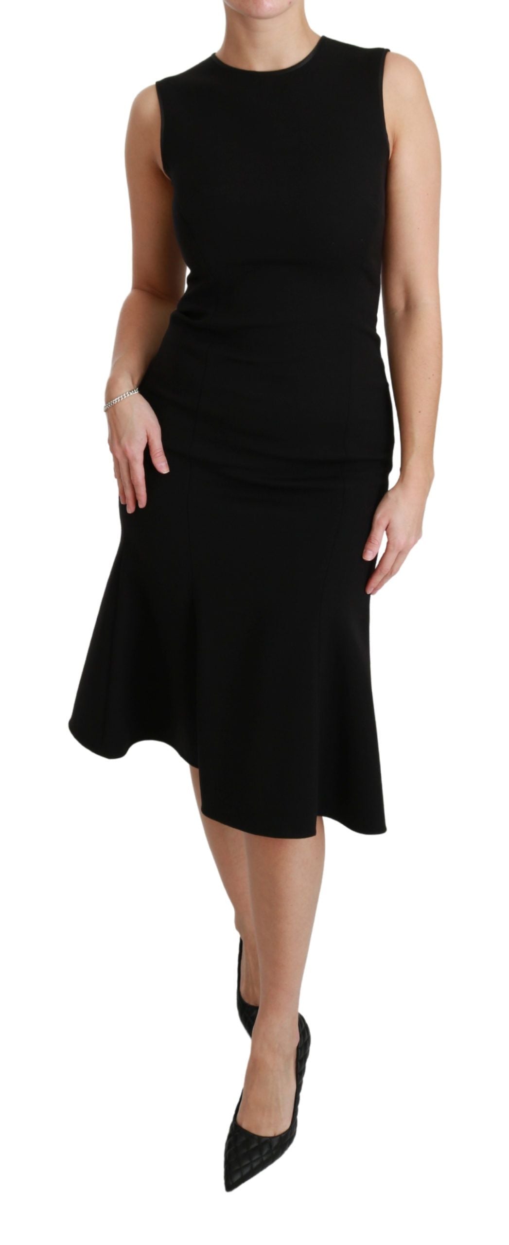 A black fit flare wool stretch sheath dress by Dolce & Gabbana