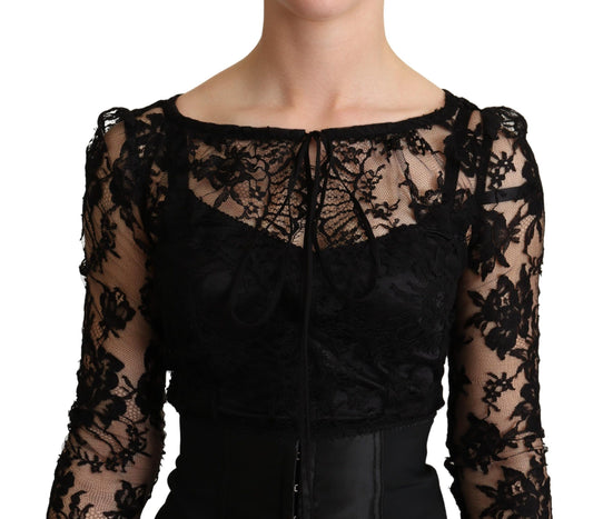 A black fitted lace top bodycon mini dress with a high neckline and long sleeves