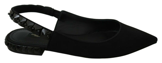 Pair of black women's sandals with rhinestones and a strap over the foot