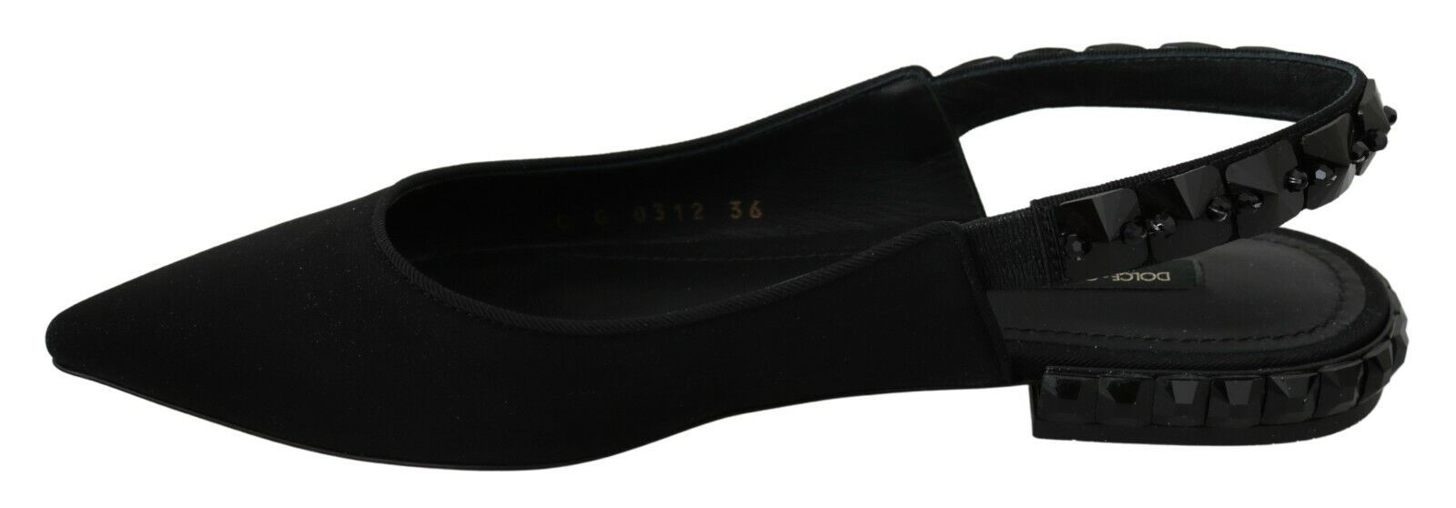 Pair of black shoes with white soles and laces