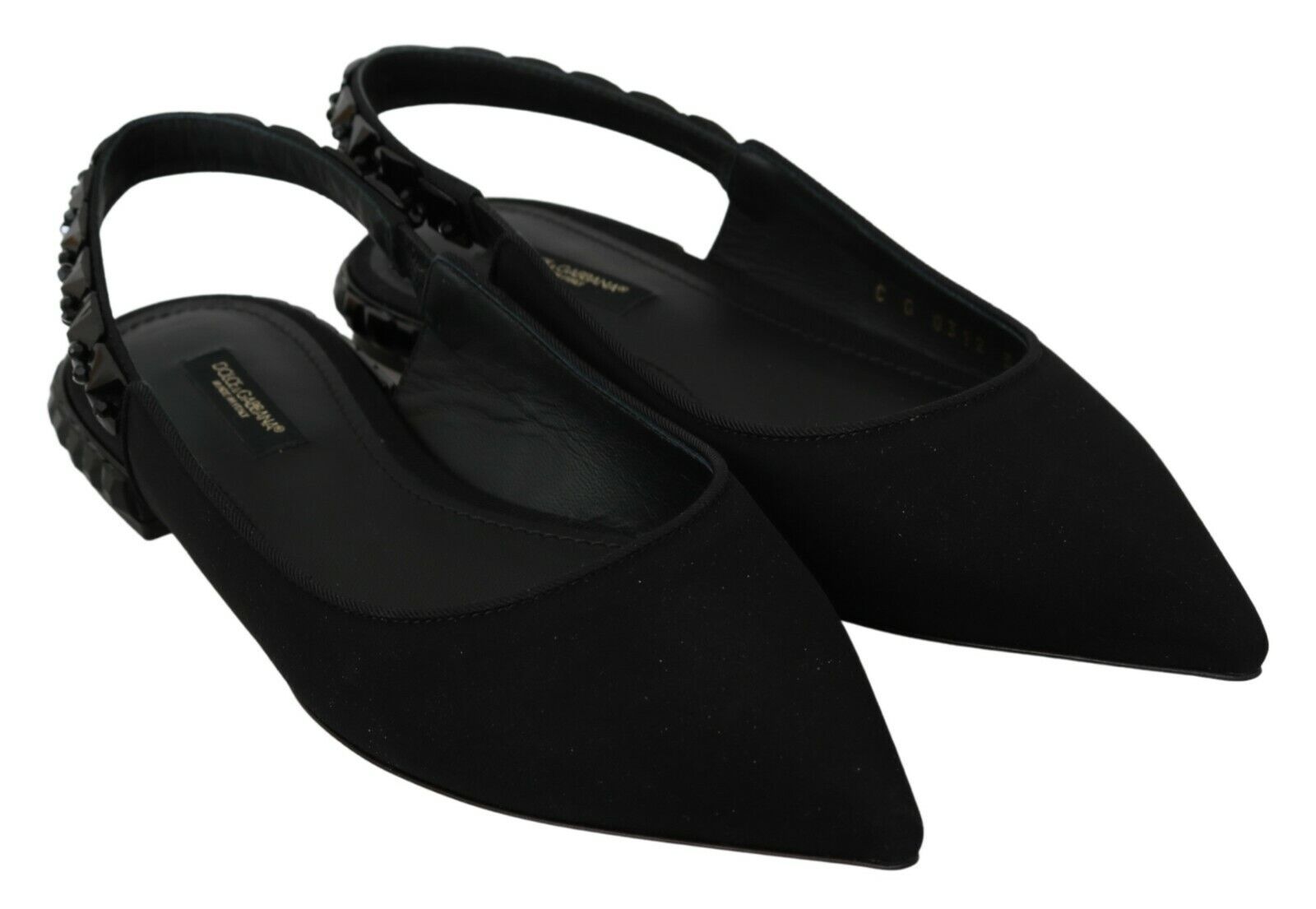Pair of black women's sandals with straps and buckles