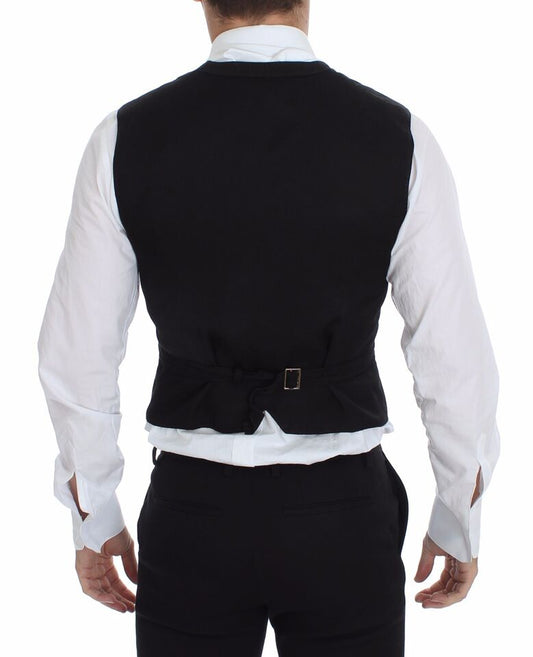A black vest with a flax cotton dress shirt, part of the Dolce & Gabbana collection