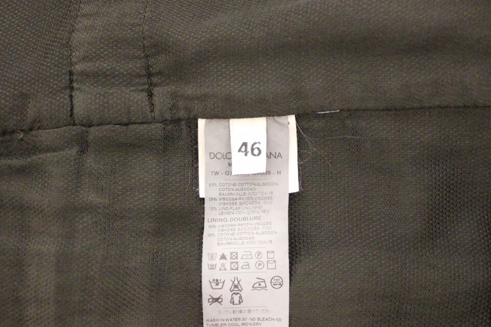 A black flax cotton dress vest blazer with a white tag inside