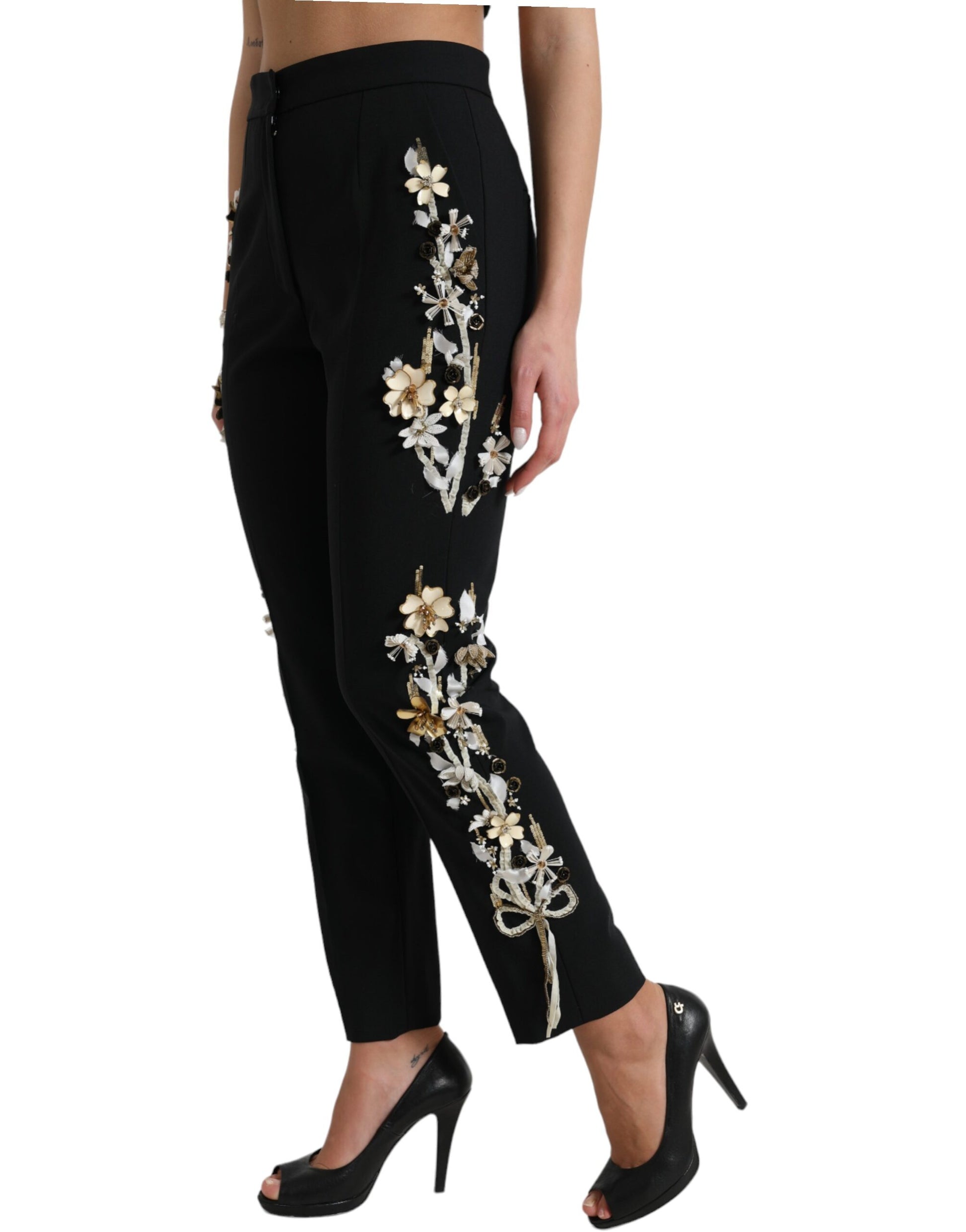 Black pants with floral embroidery on legs