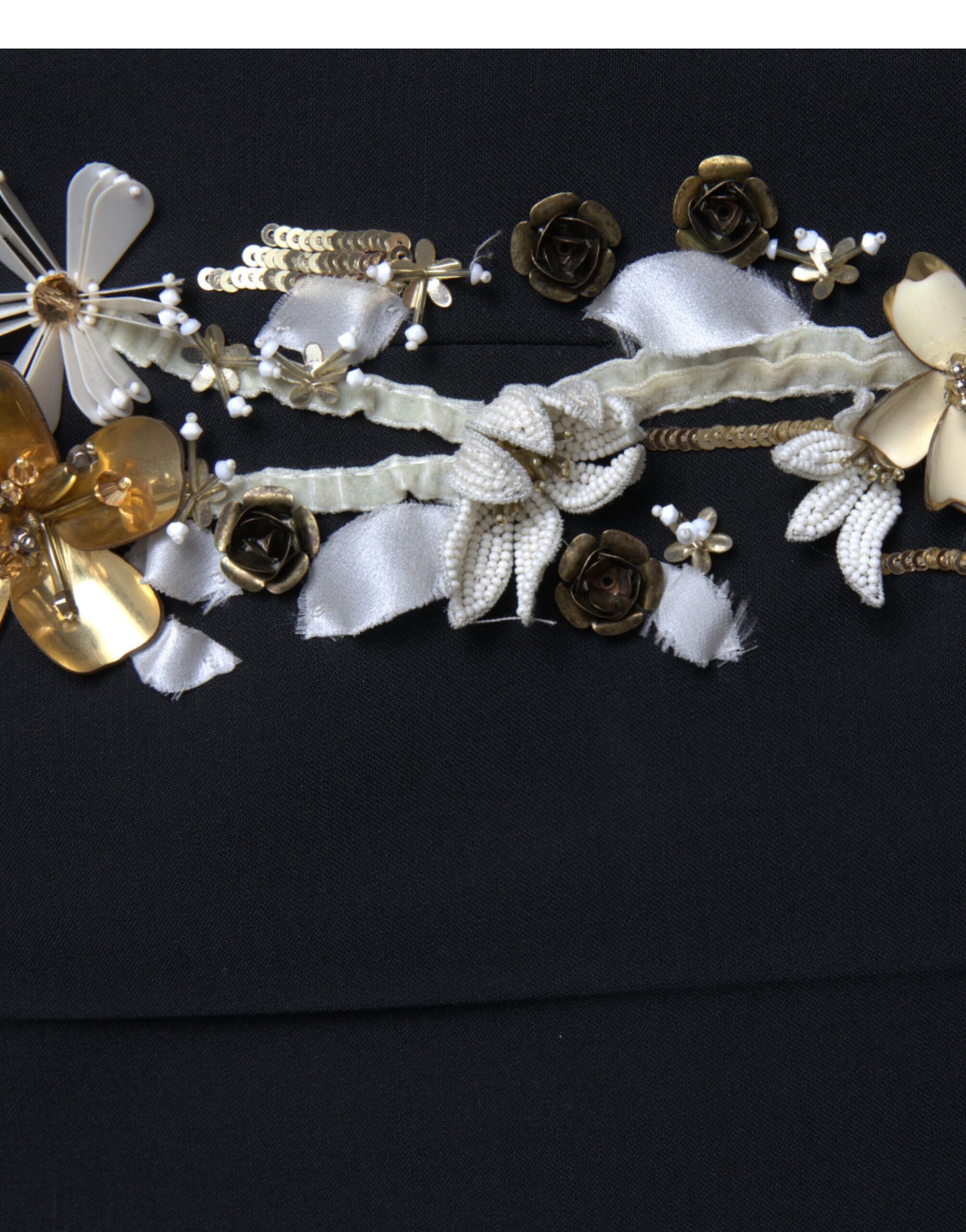 Decorative embellishments on a black garment