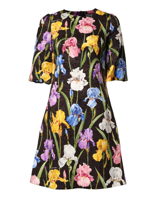 A black floral brocade dress with an A-line silhouette